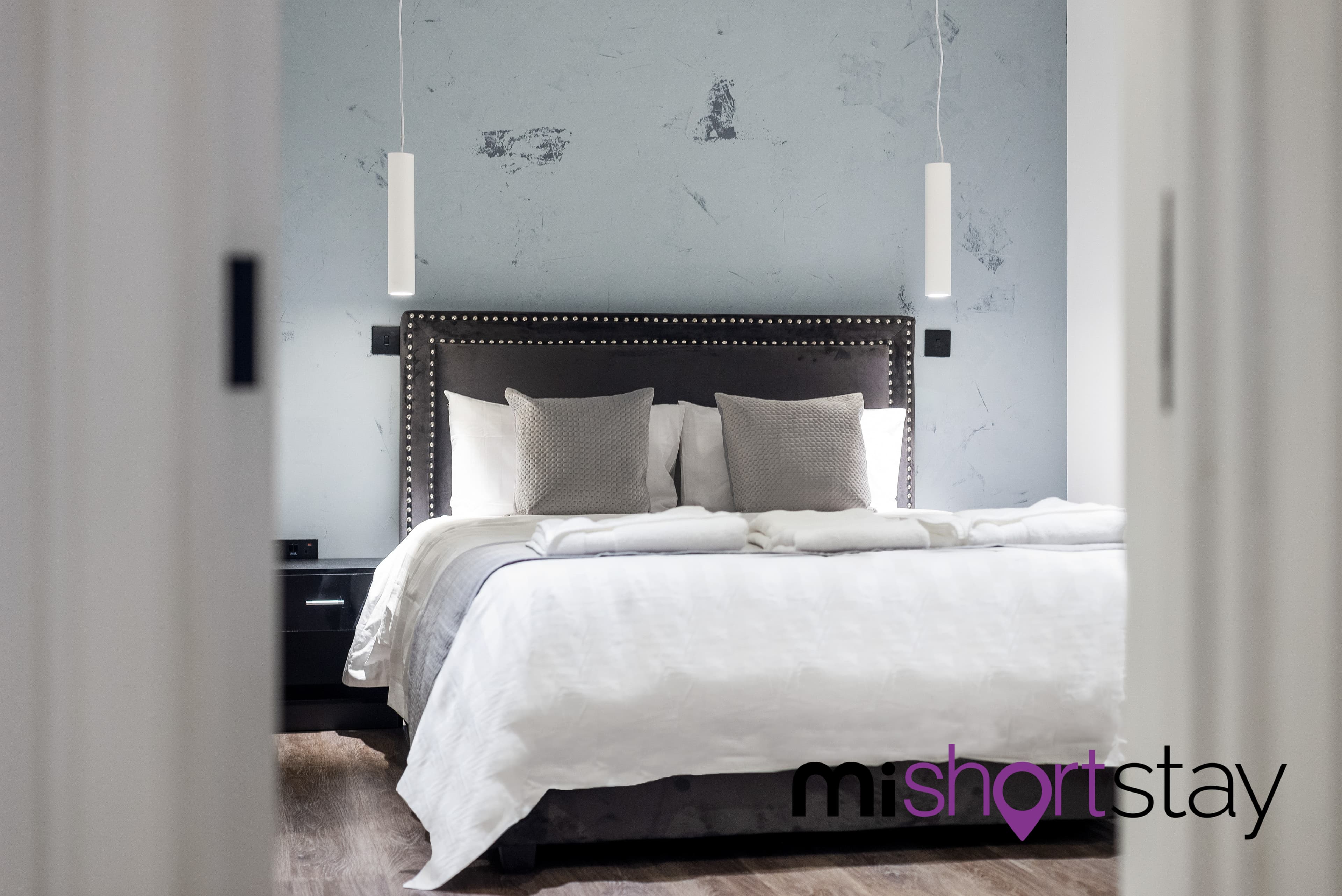 Bedroom with pendant lights